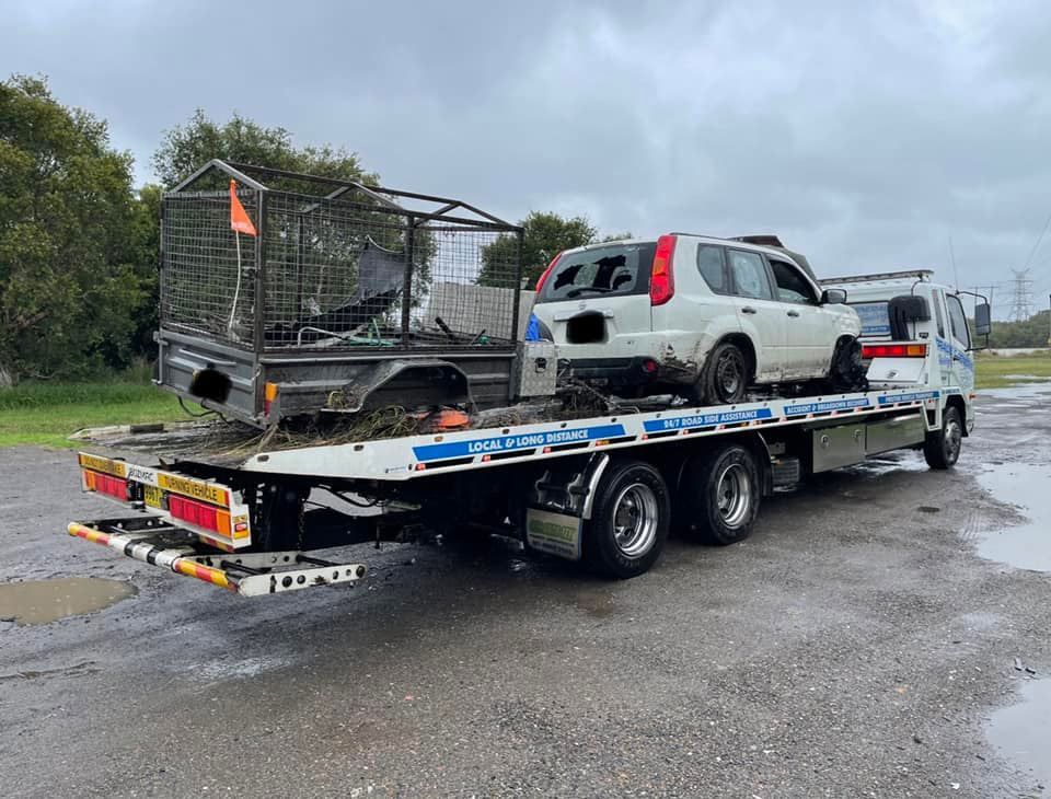 Towing the Broken Car With Box Trailers — Trade & General Towing in Nelson Bay, NSW