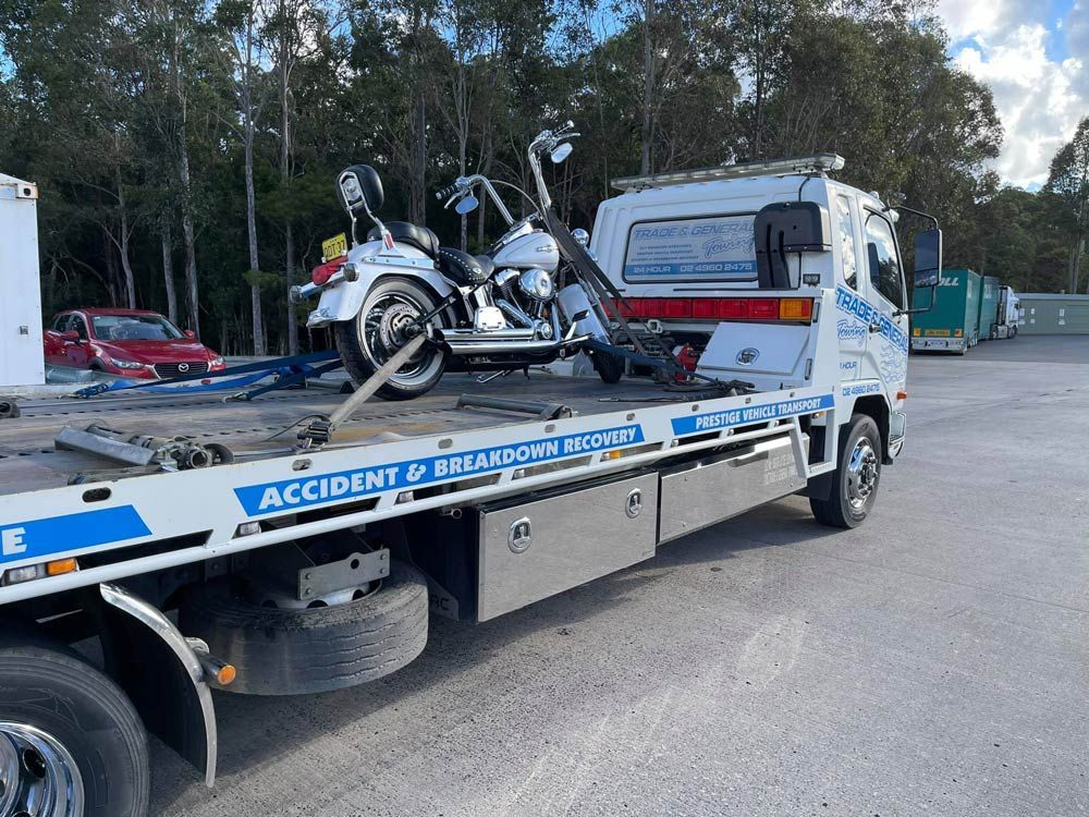 Towing the Harley Davidson Motorcycle — Trade & General Towing in Sandgate, NSW