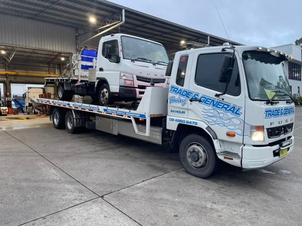 Towing the Mitsubishi Fuso Canter — Trade & General Towing in Newcastle, NSW