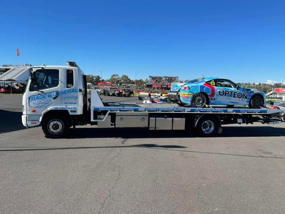 Towing the Option Racing Car — Trade & General Towing in Belmont, NSW
