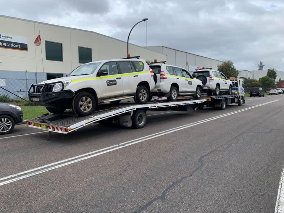 Towing the Three Company Service Car — Trade & General Towing in Sandgate, NSW