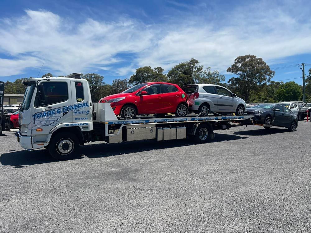 Towing the Three Light Car — Trade & General Towing in Nelson Bay, NSW