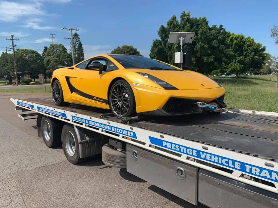 Yellow Lamborghini Gallardo Transport — Trade & General Towing in Sandgate, NSW