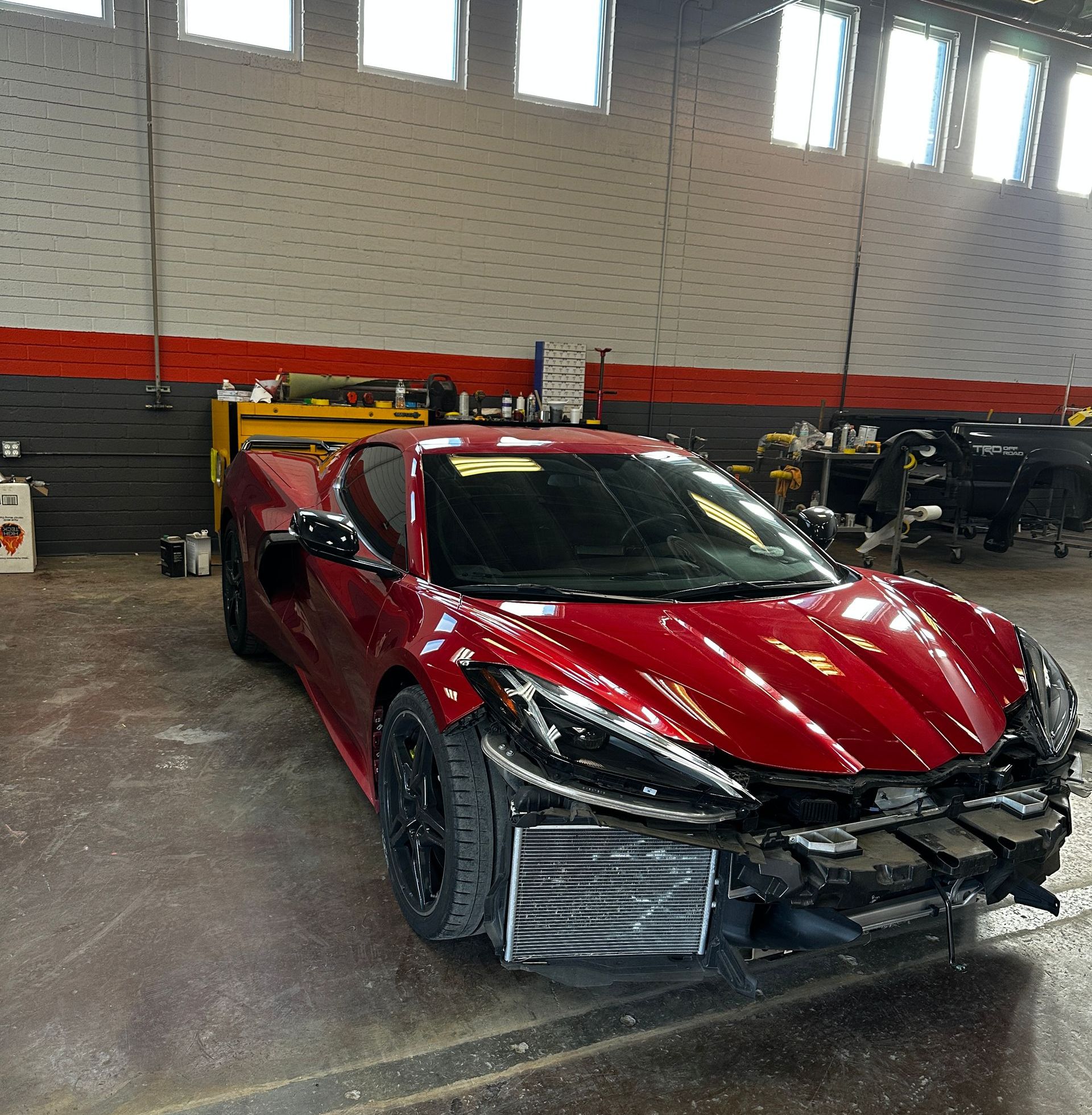 Repair and refinishing process underway in shop
