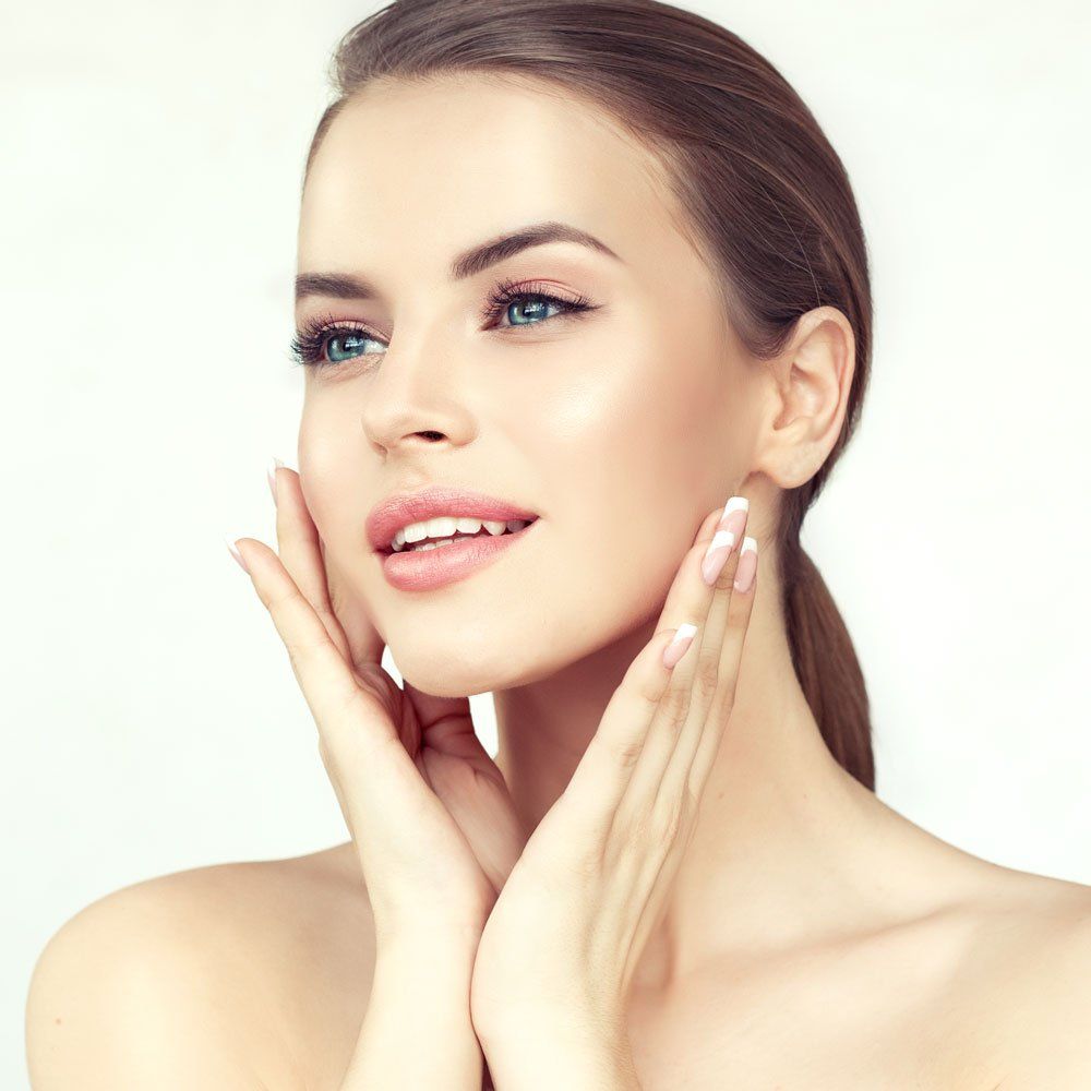 Woman Holding Her Face — Irving, TX — Dr. Reddy Medspa
