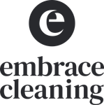 A black and white logo for embrace cleaning