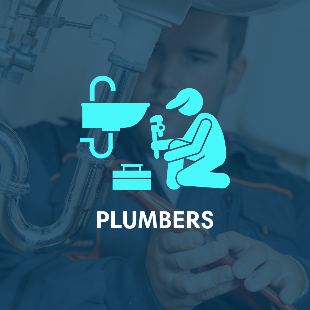 A man is kneeling down fixing a sink with a wrench.