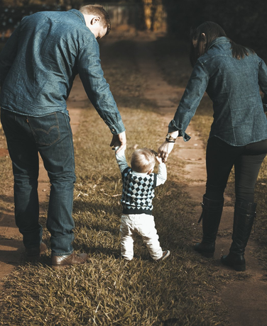 Family walking with a baby