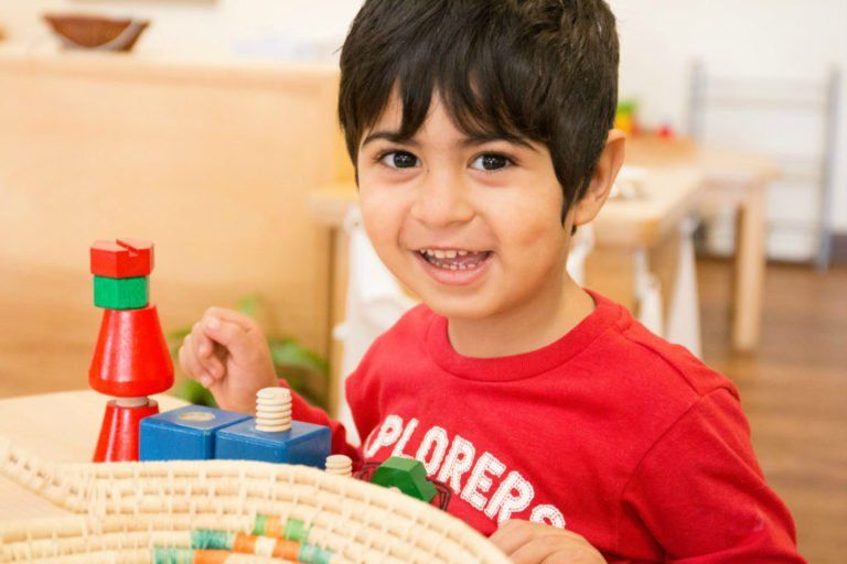 Montessori child smiling