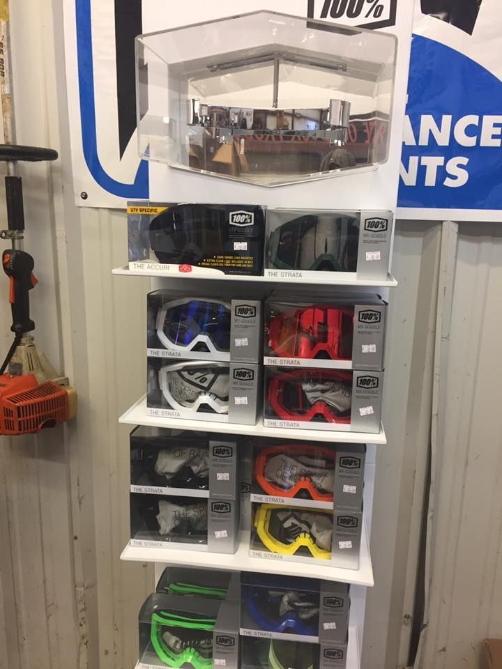 A display of goggles on a shelf in a store