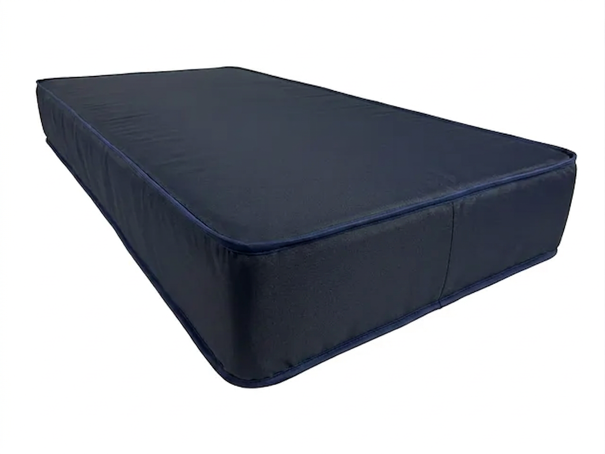 Twin XL institutional memory foam mattress with fluid-proof vinyl cover