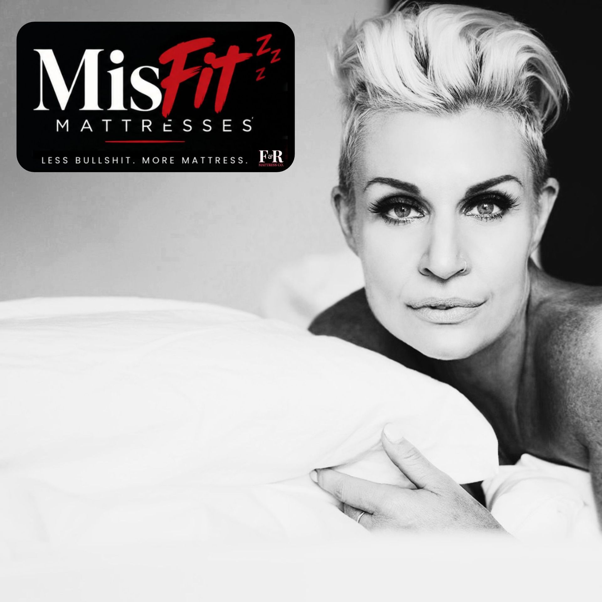Marlena, aka MisFIT, in bed — black-and-white portrait with the MisFIT Mattresses logo