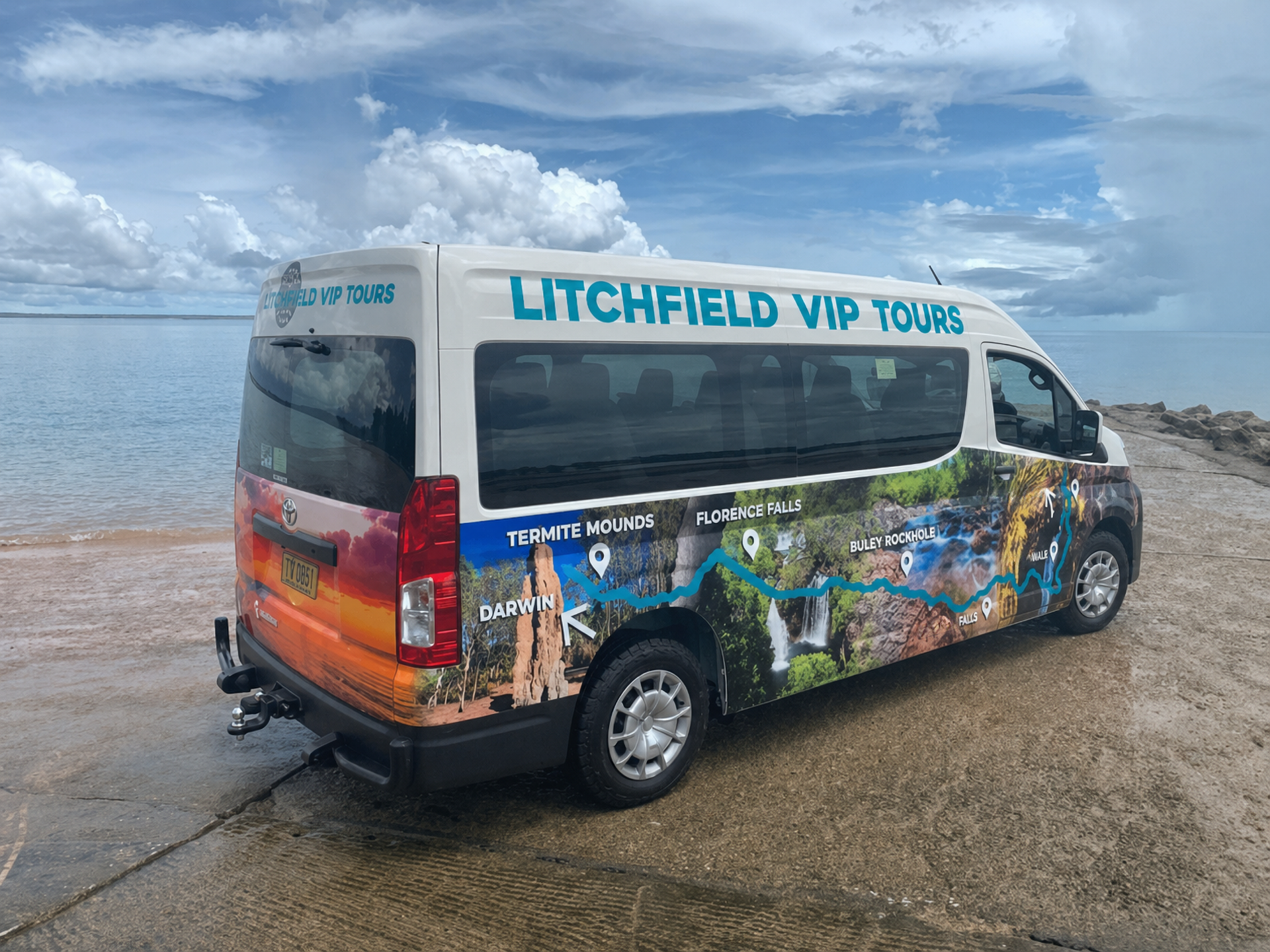 Colorful Scenery Wraps the Van's Side — Litchfield VIP Tours In Darwin City, NT