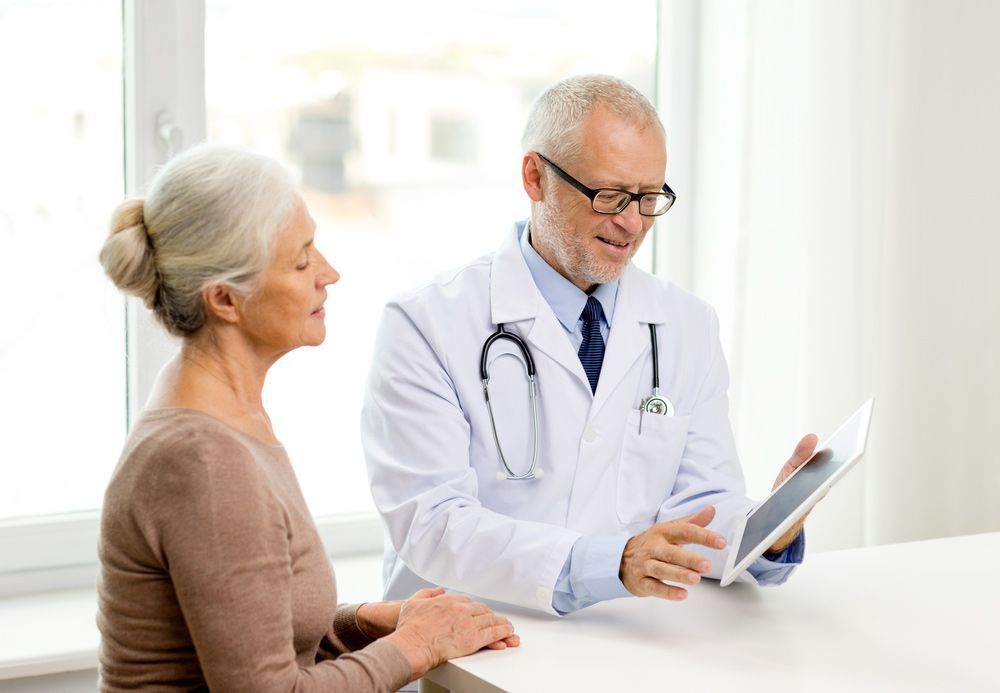 Medicine, Age, Health Care And Smiling Senior Woman And Doctor With Tablet Pc Computer Meeting — Home Medication Reviews in Wulguru, QLD