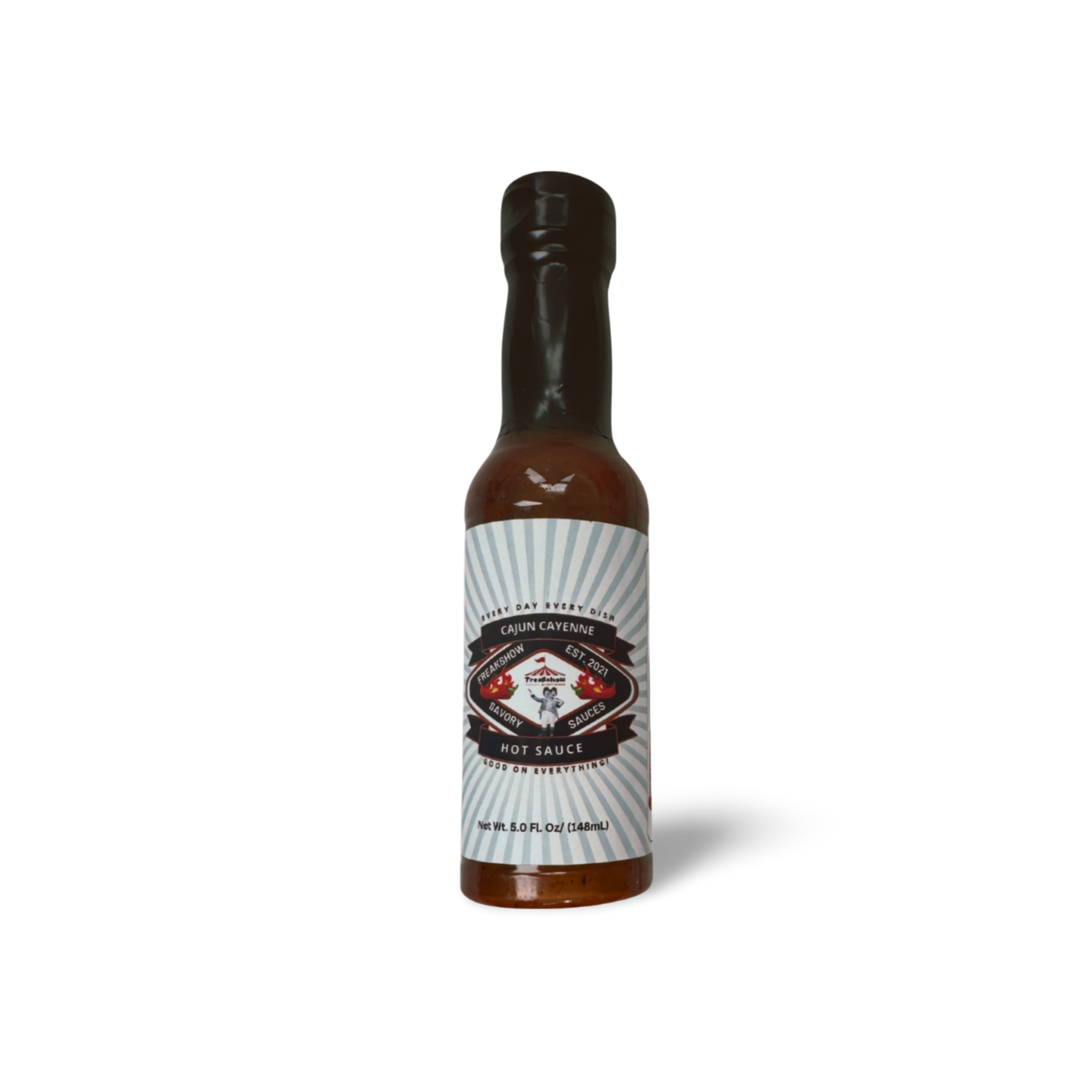 A small bottle of hot sauce with a white label