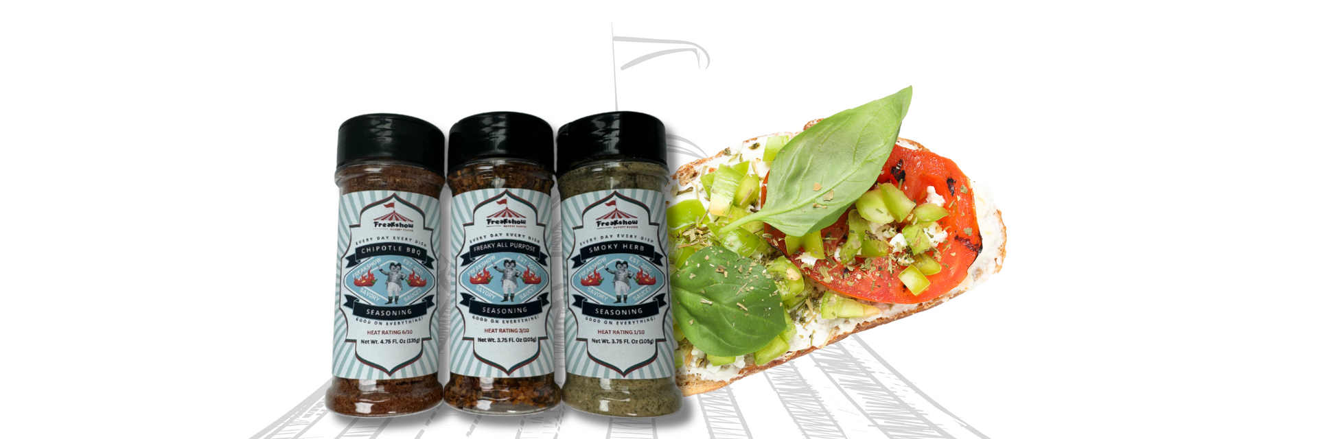 Three bottles of seasoning are sitting next to a sandwich.