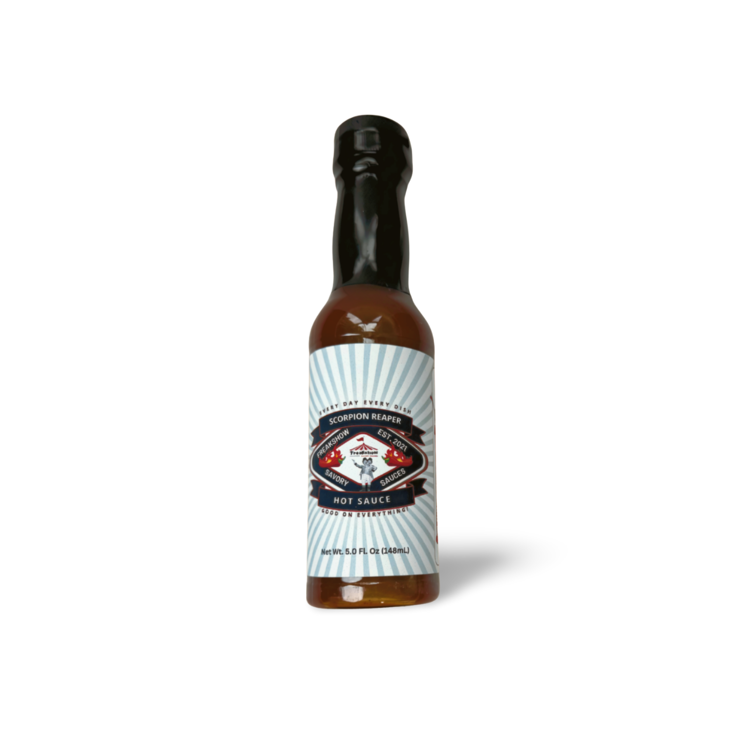 A small bottle of hot sauce on a white background
