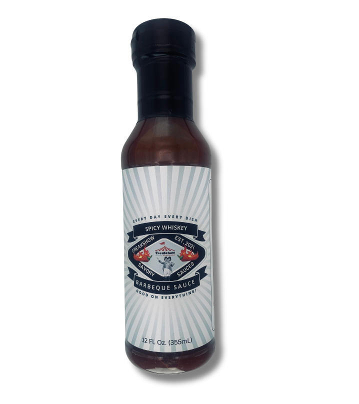 A bottle of hot sauce with a white label on a white background