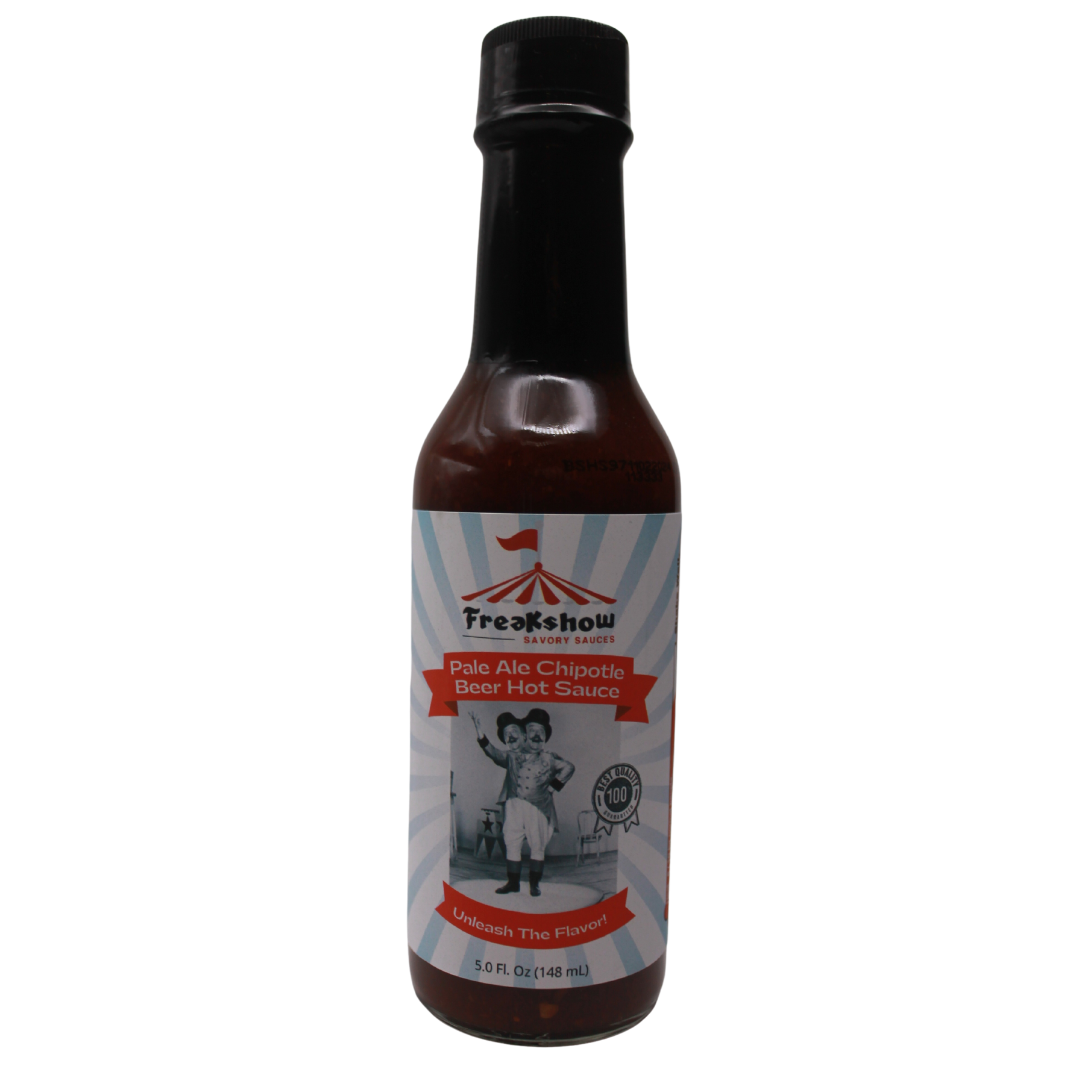A bottle of hot sauce with a picture of a man on the label.