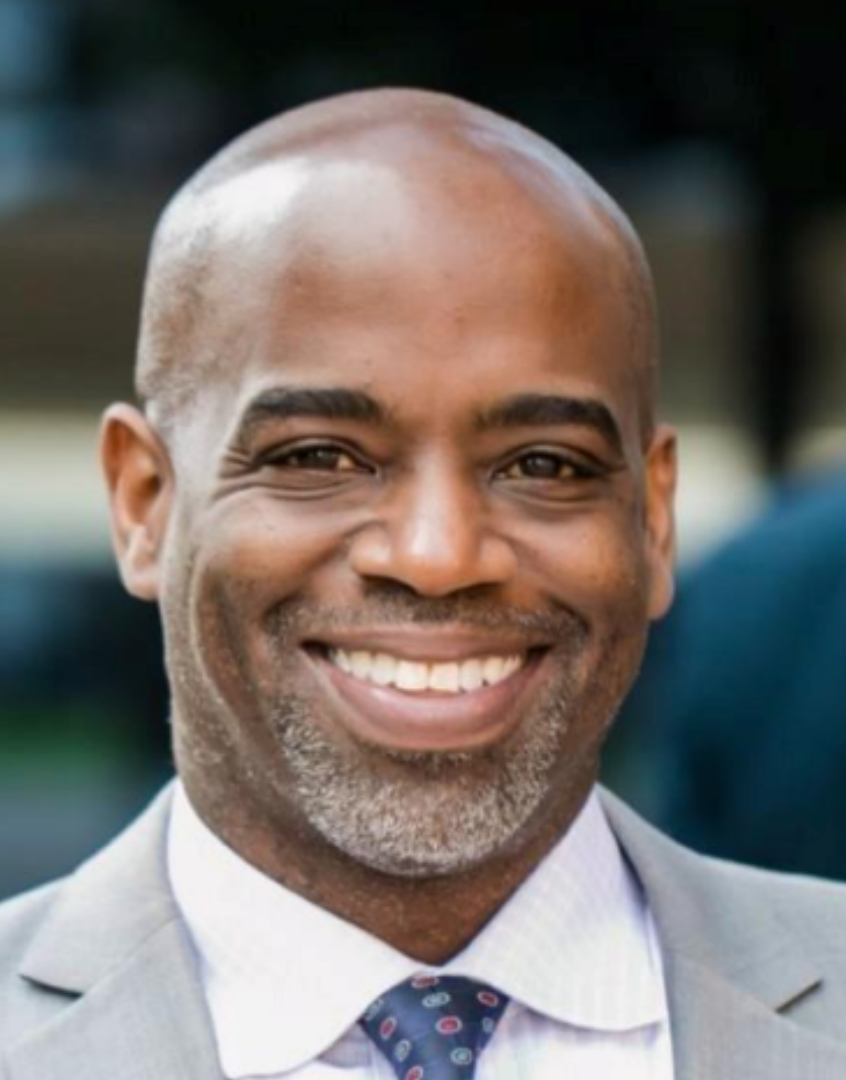 A man smiling at the camera