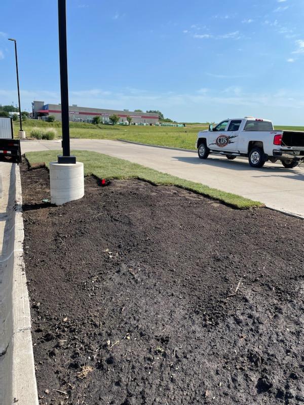Grading and sod installation at a Central Iowa commercial landscape project