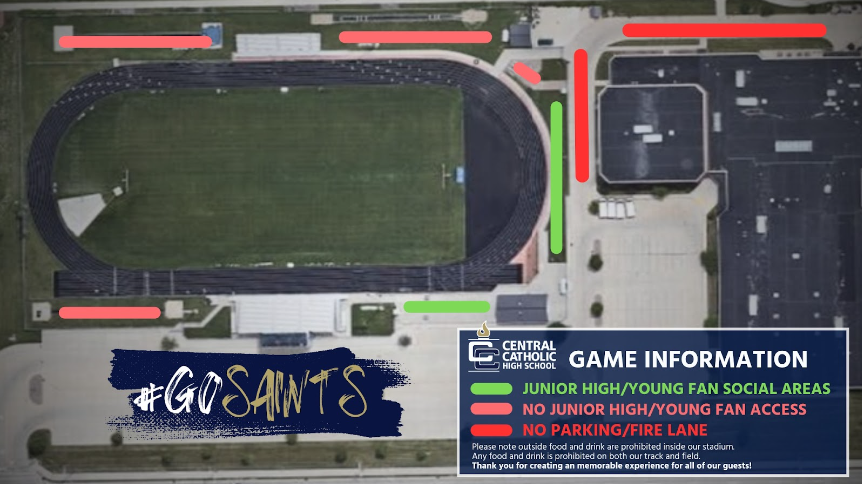 An aerial view of a stadium with a game information sign.