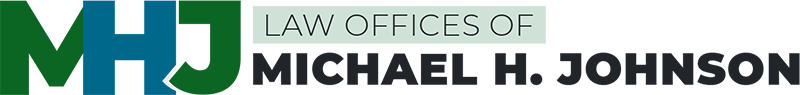 A logo for the law offices of michael h. johnson