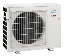 White Mitsubishi Electric outdoor air conditioner unit with large front fan grille