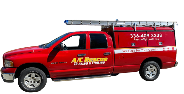a red truck with a ladder on top of it .