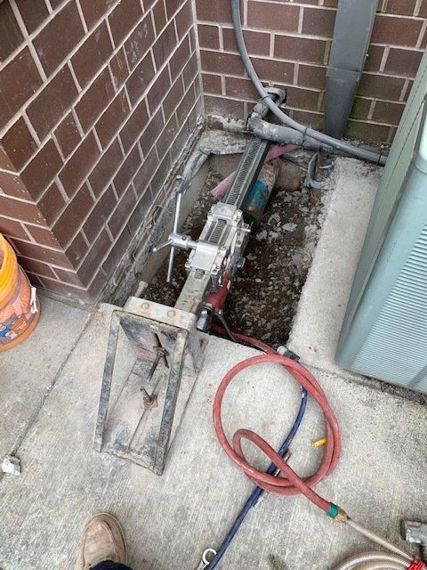 Hole in cement floor outside — Vancouver, WA — Accurate Concrete Cutting
