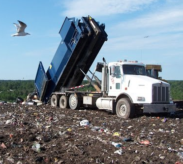 A dump truck with the word kenworth on the side