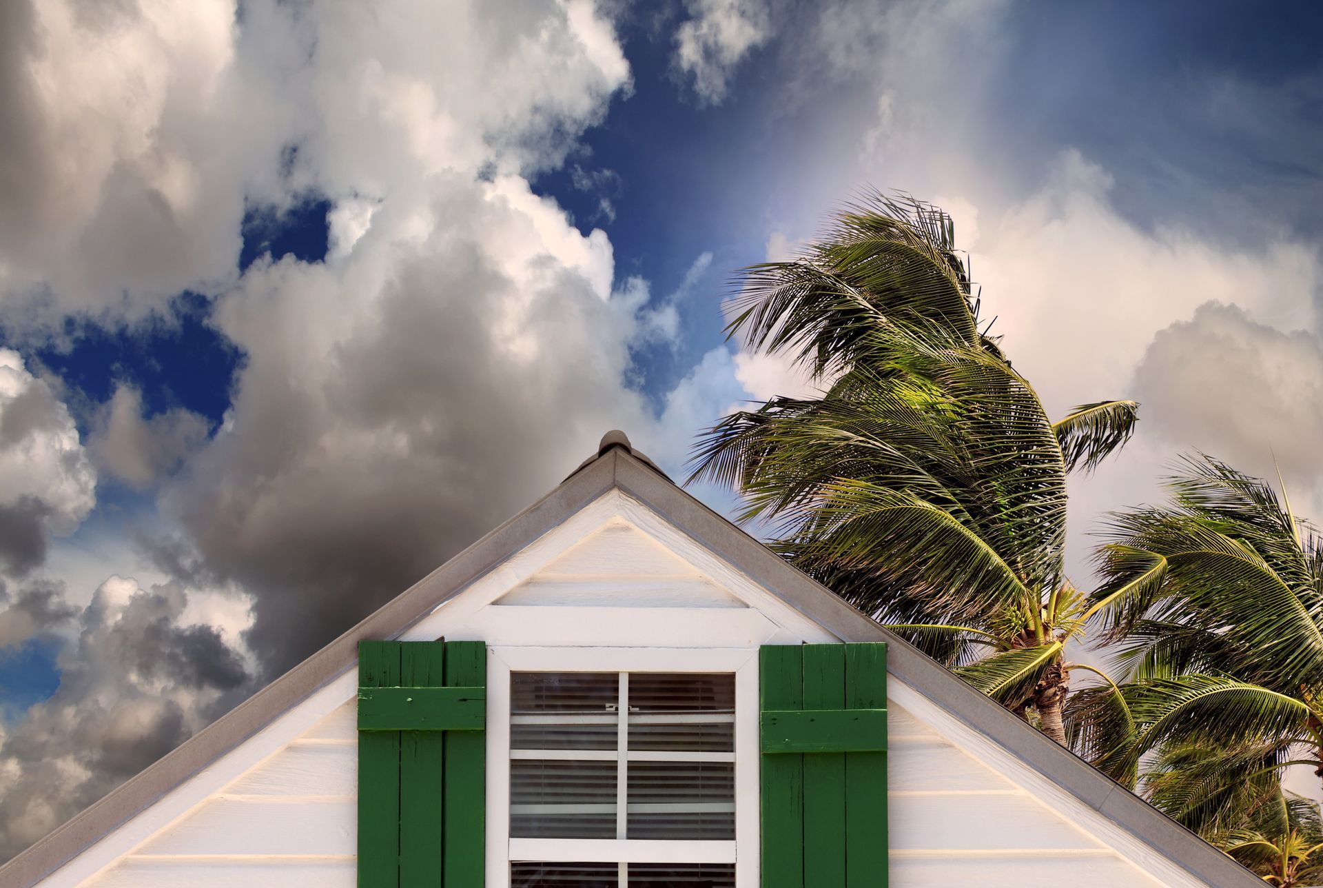 North Palm Beach home experiencing heavy rain and strong winds during a South Florida hurricane.
