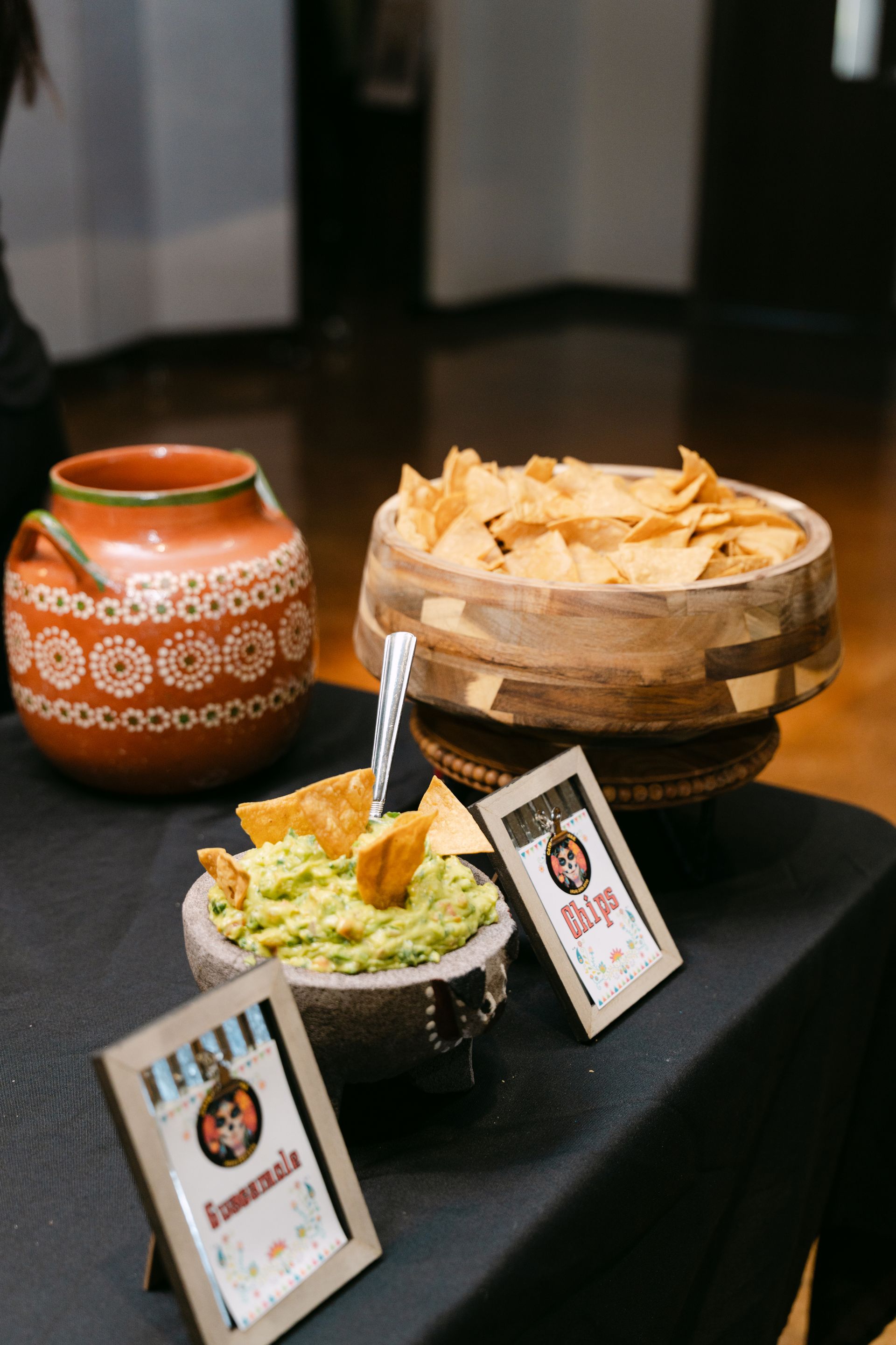 Guacamole, tortilla chips, and salsa displayed at a party.
With Love, Wedding management, Milwaukee Wedding Coordinator