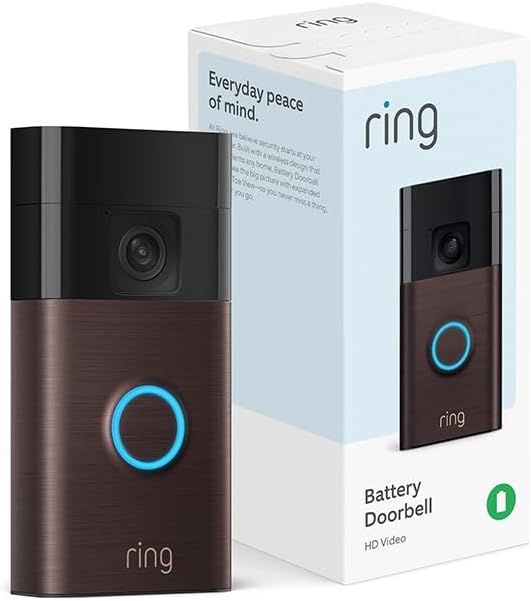 A ring battery doorbell is sitting next to its box