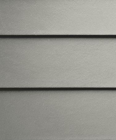 Gray textured wall with two horizontal dark trim lines