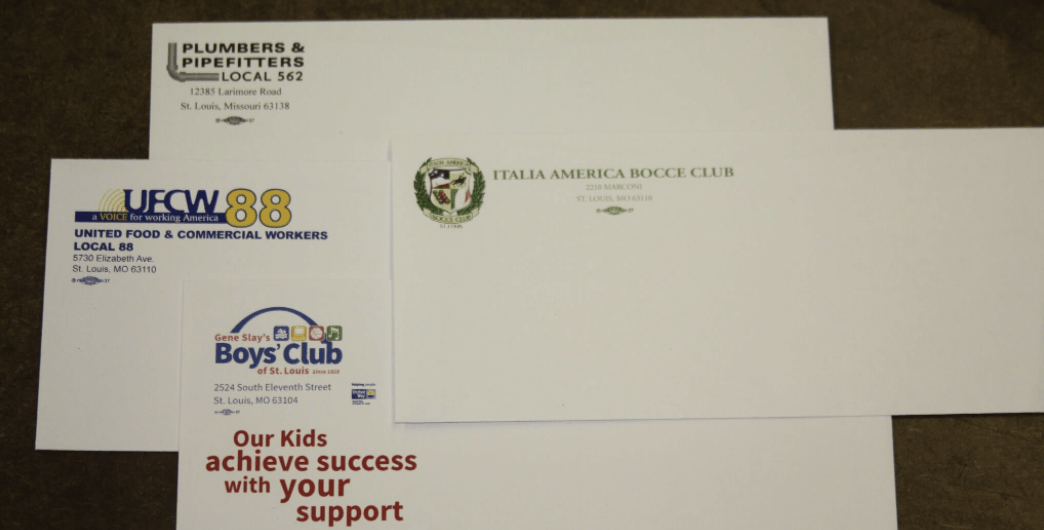 Four white envelopes with logos of a plumbers union, a grocery workers union, a Boys & Girls Club, and a labor council.
