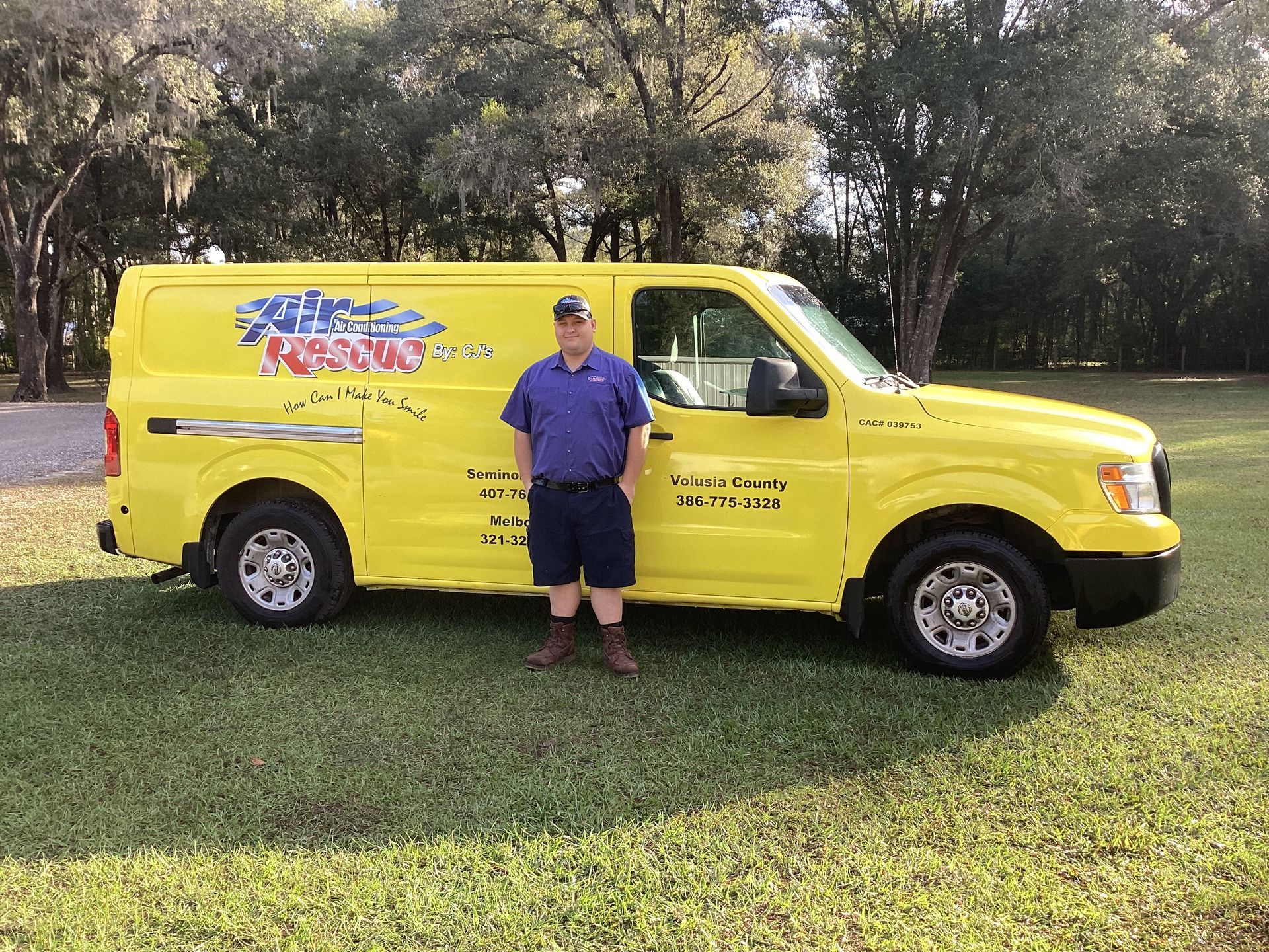 Air Rescue service technician outside of work truck.