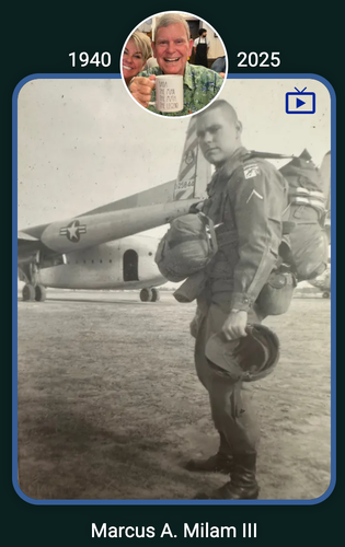 Black-and-white portrait of an airman in flight gear standing beside a military aircraft.