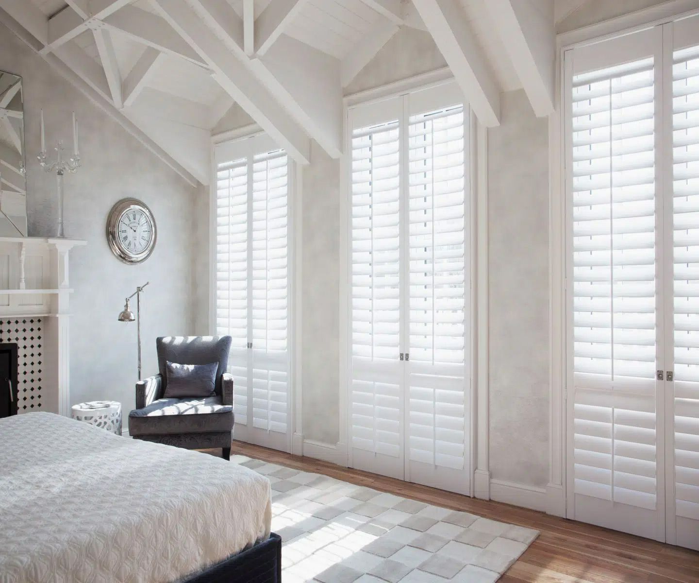 Bedroom With White Shutters
