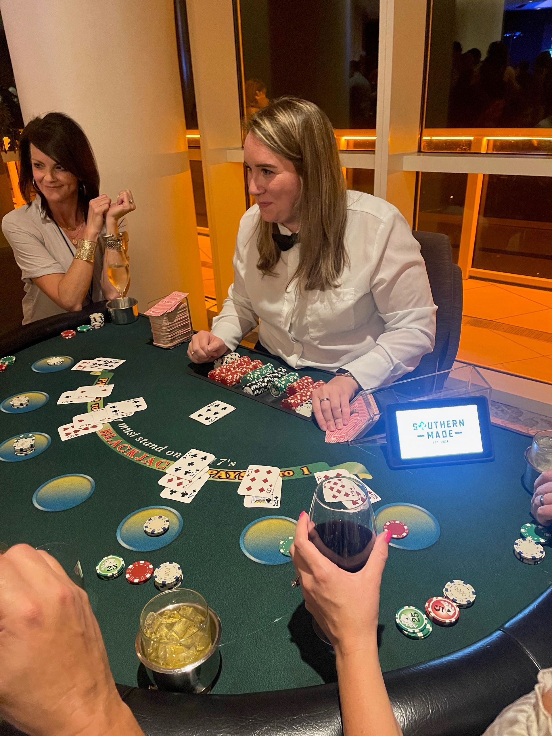 Blackjack table fun with dealer. 