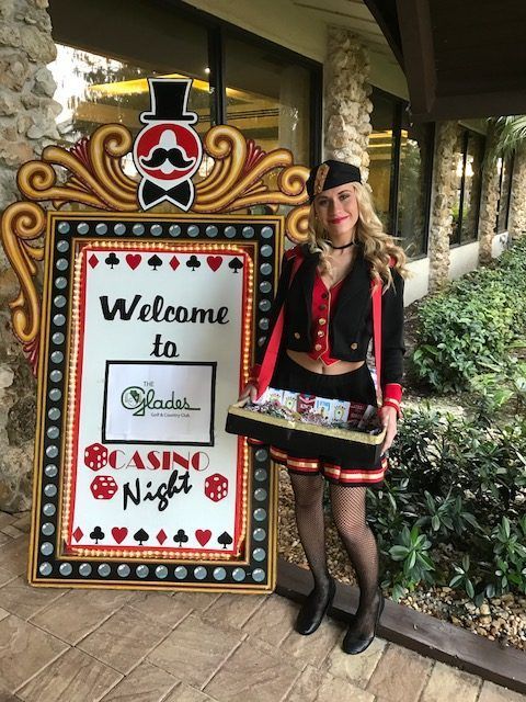 Cigarette girl with marquee sign