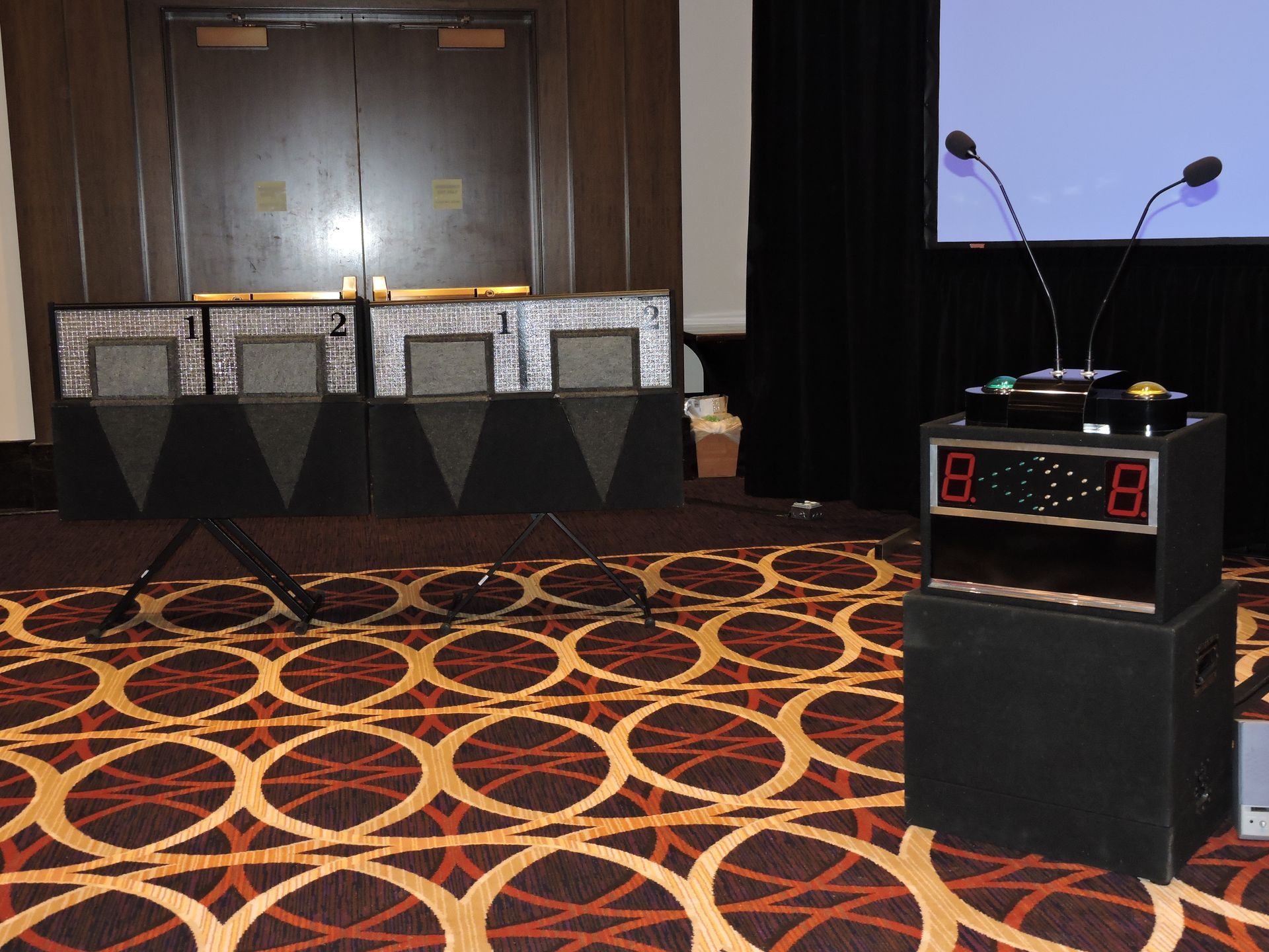 Podiums, Buzzers and microphones for game shows that include team building or just for fun. 