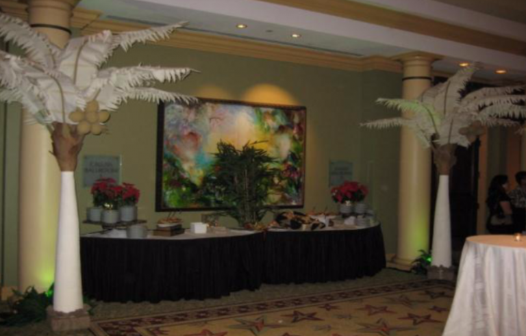 Great Gatsby theme with elegant white palms and other associated props 