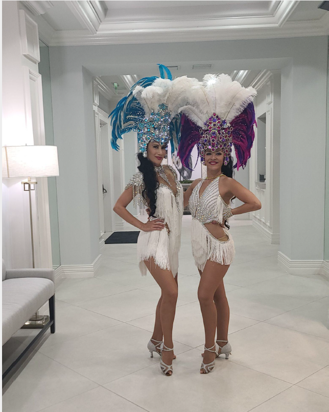 two showgirls in our white hot theme.
