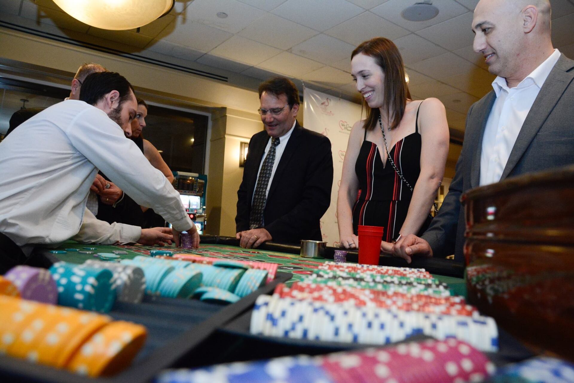 Roulette action with guests and croupier 