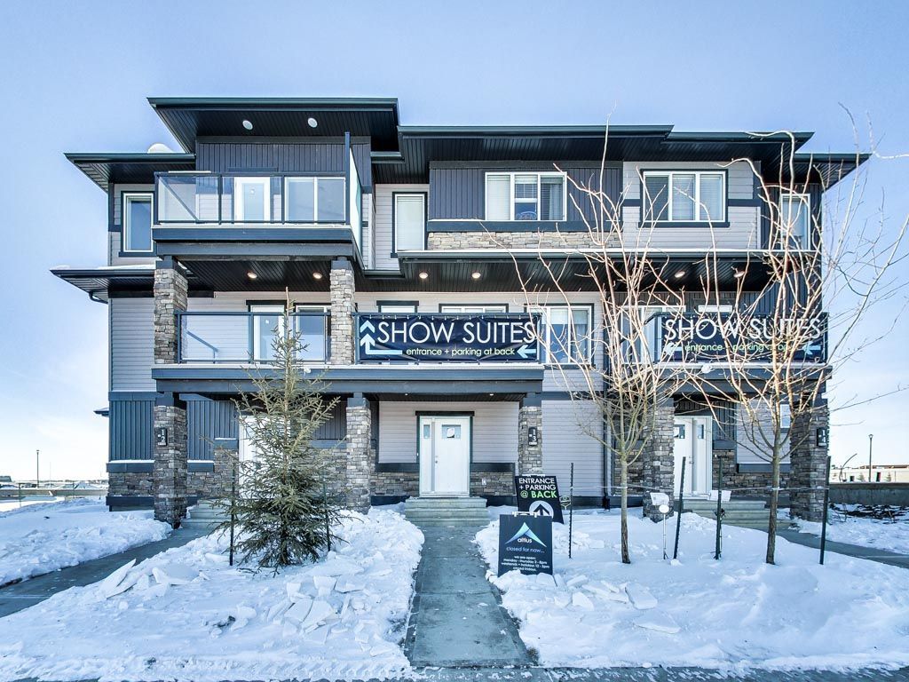 Three-story condo building with 