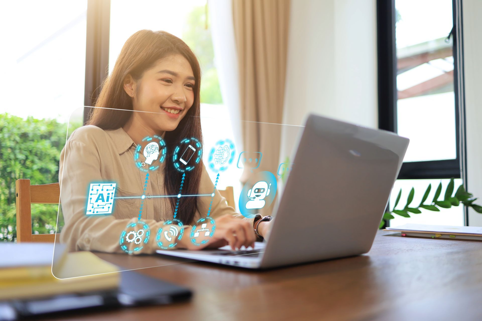 Asian woman using laptops to communicate with business stakeholders via AI and chatbot technologies