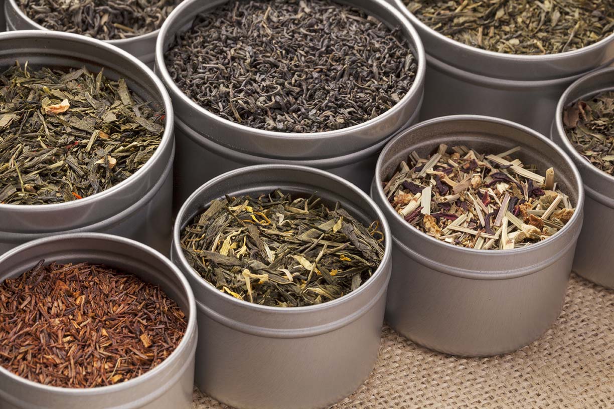 Loose leaf whole tea leaves brewed in a gaiwan — Adhara Tea & Botanicals