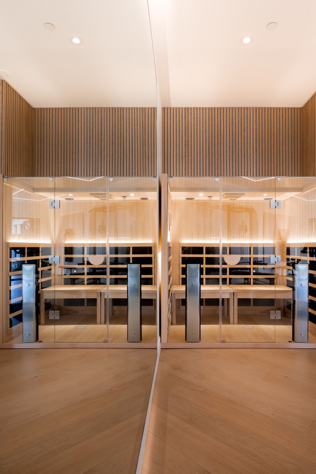A room with a lot of shelves and a mirror on the wall.