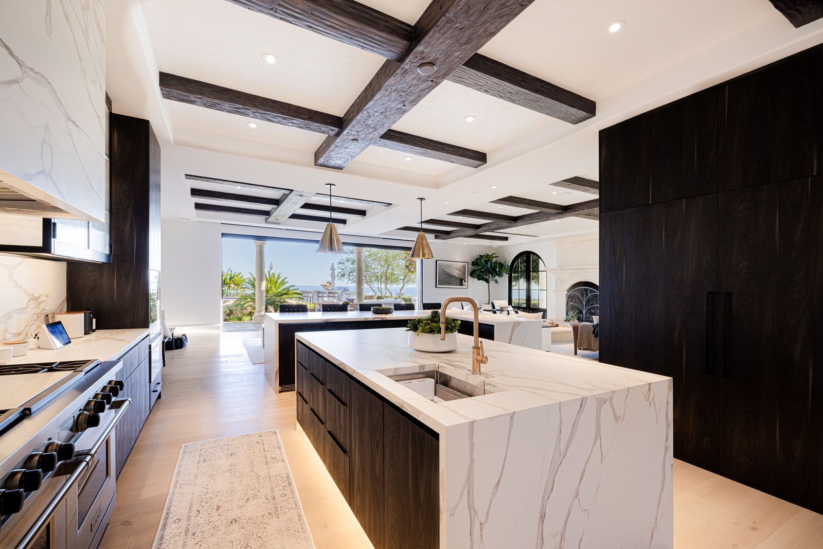 There is a large island in the middle of the kitchen.
